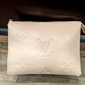 Beige bag with three compartments